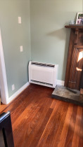 Floor mounted heat pump - We installed a floor mounted heat pump/air conditioning unit as it worked best in the space of this family home in Glen Eden, Auckland.