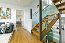 Ridge rd, Paremoremo - Cain Built Ltd. - Open tread American Oak stairs to give the entrance that wow factor