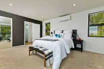 Ridge rd, Paremoremo - Cain Built Ltd. - Master bedroom with ensuite and walk-in wardrobe