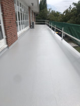 Renewed concrete deck! - Complete Waterproofing and Building Maintenance limited removed the worn out rubber membrane and applied Equus Liquid membrane system over the concrete substrate. What a result!