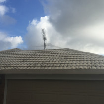 Pressed metal roof before cleaning by Roof Restore