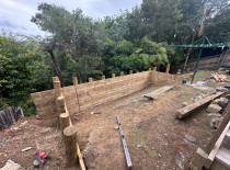 Reclaiming land on a slopey Titirangi section