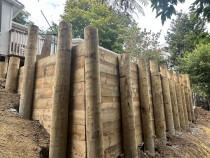 Just needs a top cap to finish off, another happy customer reclaiming sloping land in Titirangi