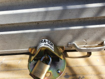 Garage Door locks - Needing more security for your garage ? Harsp and padlocks bolted into the ground