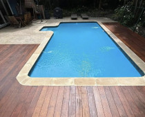 Deck refurbishment #4 - strengthened old decking piles and poured new cobble stones, stamped concrete as well as replace decking with 140mmx19mm Kwila