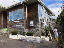 Painting a house in Meadowbank, Auckland