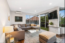 Painting a house in Meadowbank, Auckland