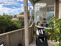 Painting a house in Meadowbank, Auckland