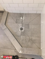 Bathroom and shower tiled (wall and floor)