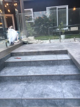 Stone tiling - swimming pool steps