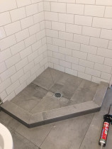 Bathroom and shower tiled (wall and floor)