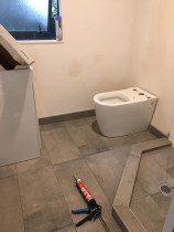 Bathroom and shower floor tiled