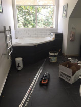 Bathroom: floor and wall tiled