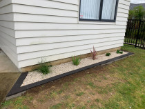 Edging, plants and white pebble