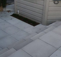 New paved garden. - Here we layed grey smooth pavers and bullnose steps.