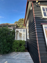 Oiling cedar weatherboards and old windows restoration