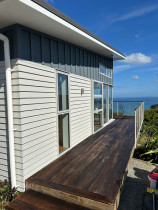 Painting the weatherboard and deck oiling (after)