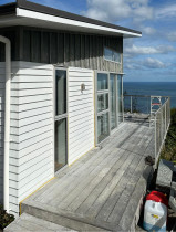 Painting the weatherboard and deck oiling (before)