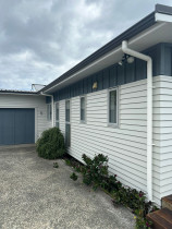 Painting the weatherboard and deck oiling (after)