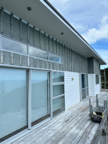 Painting the weatherboard and deck oiling (before)