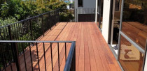 Renovated tiled floating deck, waterproofed and replaced with kwila. Renovated raw iron handrail lifted to code.