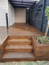 Kwila decking with pine privacy screen and solar lights. 1/3