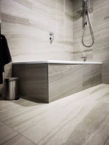 Bathroom tiling by ROIOOI Company