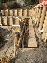 New retaining wall - Tierred retaining wall to accommodate a large storm water pipe