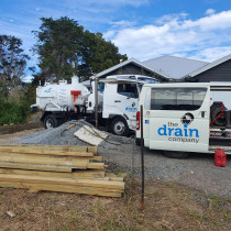 The Drain Company - Cleaning a Septic tank with our Vacuum truck