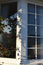 After and Before - Thermawood Auckland - Original window with colonial bar and condensation, new double glazed window no-condensation