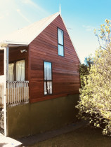 Reclad by Top 2 Bottom Carpentry Ltd - The property the existing Cedar weather boards were completely warped and split due to the UV rays drying them out.
So we removed the existing Cedar and windows, fitted new building wrap, re-dressed the window reveals, and the fitted the pre-stained cedar cladding.
The client was very pleased with the result!