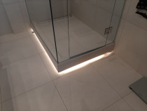 Shower base lighting by TopMark Electrical - TopMark Electrical are able to offer interesting lighting features to our clients offering style and functionality to any space.