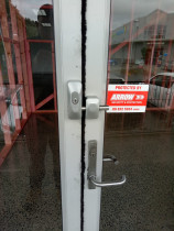 Double Lock Block - Western Lock Services Ltd - Double lock block securing a commercial entry door