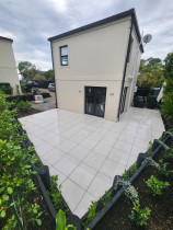 43sqm angular construction tile deck on aluminium frame, groundscrews and jacks - We love this deck! A great project with plenty angled edges requiring intricate tile cutting. Built on jacks and groundscrews due to a mixed concrete and earth base on aluminium frame.
