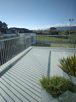 4. Apartment deck makeover pic 4 - After - What a difference! The colour used was again our most popular Galena Grey. What a lovely place to enjoy the sunshine!
Location - Raumati