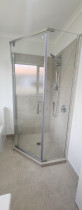 Shower Installation Completed - New shower installed, sealed, and ready for use.