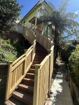 Bespoke custom staircase - Where master craftsmanship meets a challenging landscape.
This grand timber staircase creates an elegant, seamless journey.
Handcrafted to conquer the steep hillside with grace and strength.
Its rich tones and robust form are a statement of enduring quality.
Connecting home and nature with a truly mighty, bespoke finish.