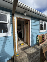 Back door Removal - Removed back door, and installed weatherboards