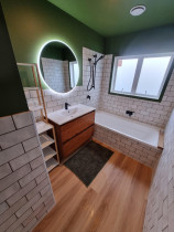 Bathroom - Tiled bathroom walls and bath with 300mm×75mm ceramic tile