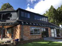 Upper storey addition - New addition in keeping with the existing structure.