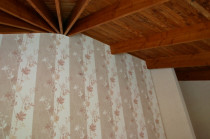 Tall papered feature walls by Celt Paint And Paper