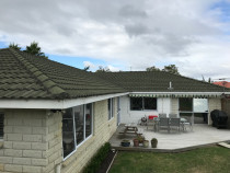 Tile roof and fascia re-paint Before Complete Waterproofing and Building Maintenance Ltd