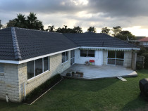 Tile roof and fascia re-paint After Complete Waterproofing and Building Maintenance Ltd