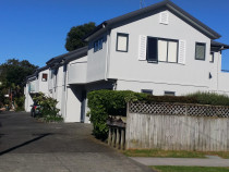 Browns Bay - 2017 - D&R  Painting Ltd - These townhouses were an orange colour. we scaffolding the buildings, masked up applied paintable silicon around the joinery where it meets the plaster and also applied silicon around all areas that enter the cladding.

Plaster repairs were sealed with a cement primer and the plaster on the house had 2 coats of a Dulux high build acrylic.

It's very important to use the correct paint that has flexibility.