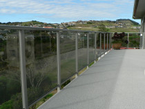 Glass balustrade with top rail completed by DECKHQ