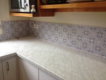 Blue and cream retro picture tiles by Just Splashbacks - Female Tiler