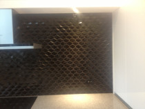 Closeup Black hexagonal tiles - will darken a room