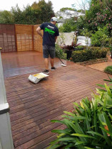 Water blast and re-staining of old decks and trellis