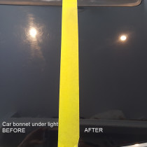 Black Car Bonnet - Before And After Cut n Polish by The Mobile Car Specialists Ltd - Bonnet under lighting with yellow tape dividing the sides:
Fine scratches and swirl marks are removed using our 3 stage cut n polish here on this Subaru. In 99% of cases, even sunscreen is removed.