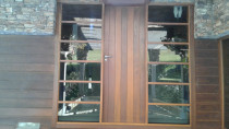 Beautiful Cedar door - Revived. Plus window clean. - We, here at TK Revive have done a number of projects where areas are tired and dull and revived them to nearly new again!